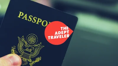 A U.S. Passport with the Adept Travel logo overlaying the picture.