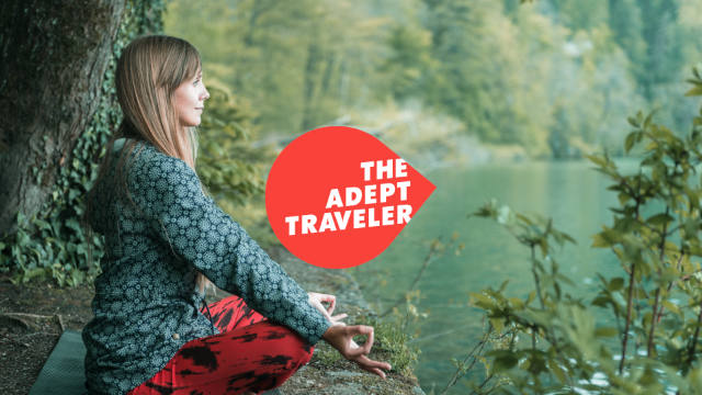 A traveler meditating in nature
