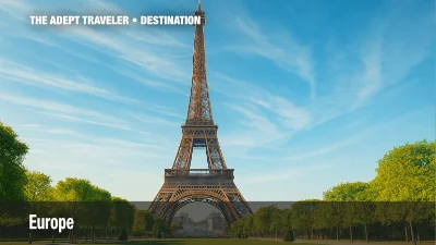 Europe continent image with the Eiffel Tower viewed from Champ de Mars under a clear blue sky.
