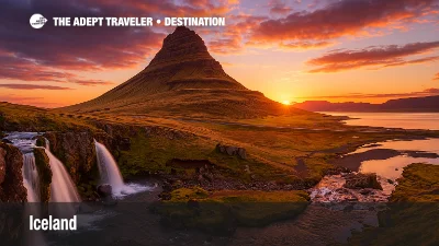 Kirkjufell mountain and Kirkjufellsfoss waterfall in Iceland at sunset, golden light reflecting on mossy cliffs and bay.
