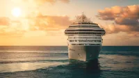 Cruise ship on the ocean during the sunset