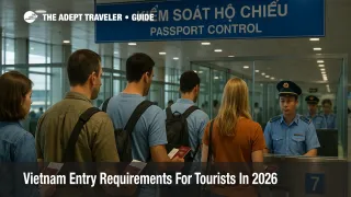 Travelers queue at Vietnam airport passport control, showing documents that illustrate Vietnam entry rules for tourists.