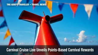 Carnival Cruise Line funnel against bright blue sky on open sea