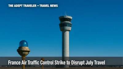 Control tower at Paris‑CDG under clear sky during France air traffic control strike.