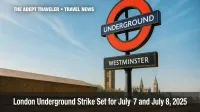 Westminster Station roundel bathed in sun ahead of London Underground strike.