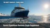 Ice-strengthened Aurora Expeditions ship navigating Antarctic brash ice during a no-solo-supplement voyage.