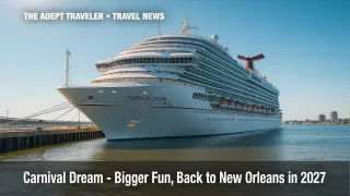 Carnival Dream docked in New Orleans under clear blue sky.