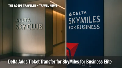 Delta SkyMiles for Business Elite banner at lounge entrance.