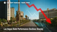 Las Vegas hotel performance decline illustrated by nearly empty Strip boulevard under bright summer sky.