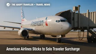 American Airlines jet at DFW gate underscores ongoing solo traveler surcharge controversy, airline pricing tactic.