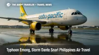 Cebu Pacific jet grounded at Manila airport amid weather-related flight cancellations from Typhoon Emong and Tropical Storm Dante.