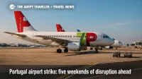 Wide view of parked jets at Lisbon Airport during peak-season Portugal airport strike disruption.