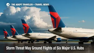 Storm clouds brew over Delta tail fins at Atlanta airport, signaling possible ground stops and flight delays today.