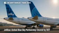 JetBlue and United jets parked tail-to-tail at JFK in a scene symbolizing the approved Blue Sky partnership.