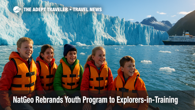 Young travelers pilot a Zodiac near an Alaskan glacier during the National Geographic Explorers-in-Training program.