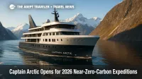 Captain Arctic expedition ship sails silently in a Norwegian fjord, showcasing near-zero-carbon Arctic expedition cruising.