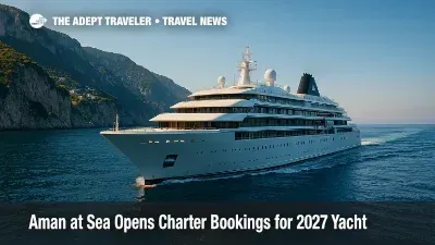 Sleek Amangati superyacht cruising past Amalfi cliffs, illustrating Aman at Sea luxury charter launch.