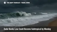 Threatening storm clouds loom over a Mid-Atlantic beach as powerful swells crash ashore during a subtropical low.