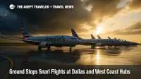 A line of rain-damp jets at DFW waits under retreating storm clouds during an FAA ground stop, highlighting weather-related travel delays.
