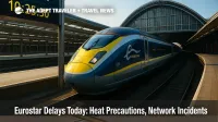 A Eurostar e320 waits beneath the St Pancras departure board as travelers face Eurostar delays today during Europe's persistent summer heat.