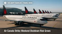 A line of parked Air Canada aircraft at Toronto Pearson under blue skies as cancellations expand ahead of a potential Air Canada strike.