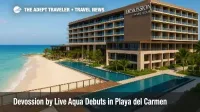 A beachfront view of Devossion by Live Aqua, an adults-only all-inclusive resort in Playa del Carmen, with pools and turquoise water.