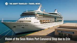 Vision of the Seas berthed at Port Canaveral under clear skies after a Hurricane Erin itinerary change, with pier and terminal in view.