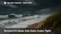 A dark, stormy sky and Atlantic waves crash onto a sandy beach, illustrating Hurricane Erin travel impacts and high surf.