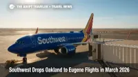 A Southwest 737 sits at an Oakland gate as crews prepare for departure, illustrating the end of Oakland to Eugene flights.