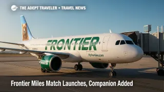 A Frontier A320neo at the gate under clear skies highlights Frontier miles match and companion certificate offers for cost-conscious travelers.