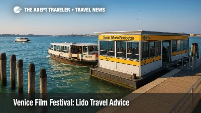 A vaporetto arrives at Lido Santa Maria Elisabetta during the Venice Film Festival, with travelers queueing and ACTV boats in view.