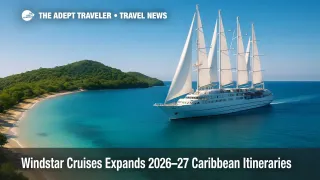 A Windstar sailing yacht glides toward a quiet Caribbean cove, showcasing small-ship access and Windstar Cruises Caribbean itineraries.