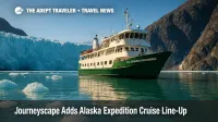 A small expedition ship navigates Glacier Bay amid blue ice and cliffs, illustrating an Alaska expedition cruise with off-ship exploration.
