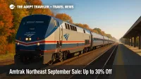 An Amtrak Northeast Regional train under clear skies pulls into a station amid early fall colors during the Amtrak Northeast September Sale.
