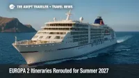 A EUROPA 2 cruise ship under clear skies near a rugged coastline, illustrating the summer 2027 EUROPA 2 itineraries that replace Red Sea routes.