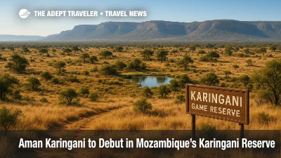 A wide Karingani Game Reserve vista with savannah and escarpment, ideal setting for Aman Karingani and a luxury safari resort experience.