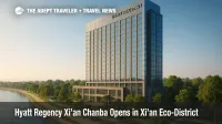 A riverside view of Hyatt Regency Xi'an Chanba with glass façades and parkland paths, highlighting the eco-district setting and the hotel opening.