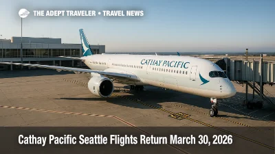 Cathay Pacific A350-900 at a SEA gate under clear skies, illustrating the return of Cathay Pacific Seattle flights and added Asia connectivity.