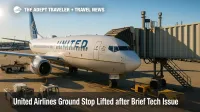 United Airlines jet at a U.S. gate during operations recovery, illustrating a brief FAA ground stop and airline IT outage response.