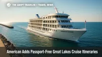American Patriot small ship cruises past a Midwest breakwater under clear skies, illustrating a passport-free Great Lakes cruise in summer.