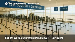Wide view of a busy TSA checkpoint with winding lines, illustrating government shutdown travel delays and air traffic controller impacts.