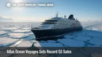 Atlas Ocean Voyages expedition yacht navigates Antarctic pack ice under clear skies, highlighting polar travel demand and record sales.