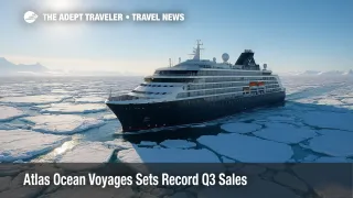Atlas Ocean Voyages expedition yacht navigates Antarctic pack ice under clear skies, highlighting polar travel demand and record sales.