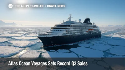 Atlas Ocean Voyages expedition yacht navigates Antarctic pack ice under clear skies, highlighting polar travel demand and record sales.