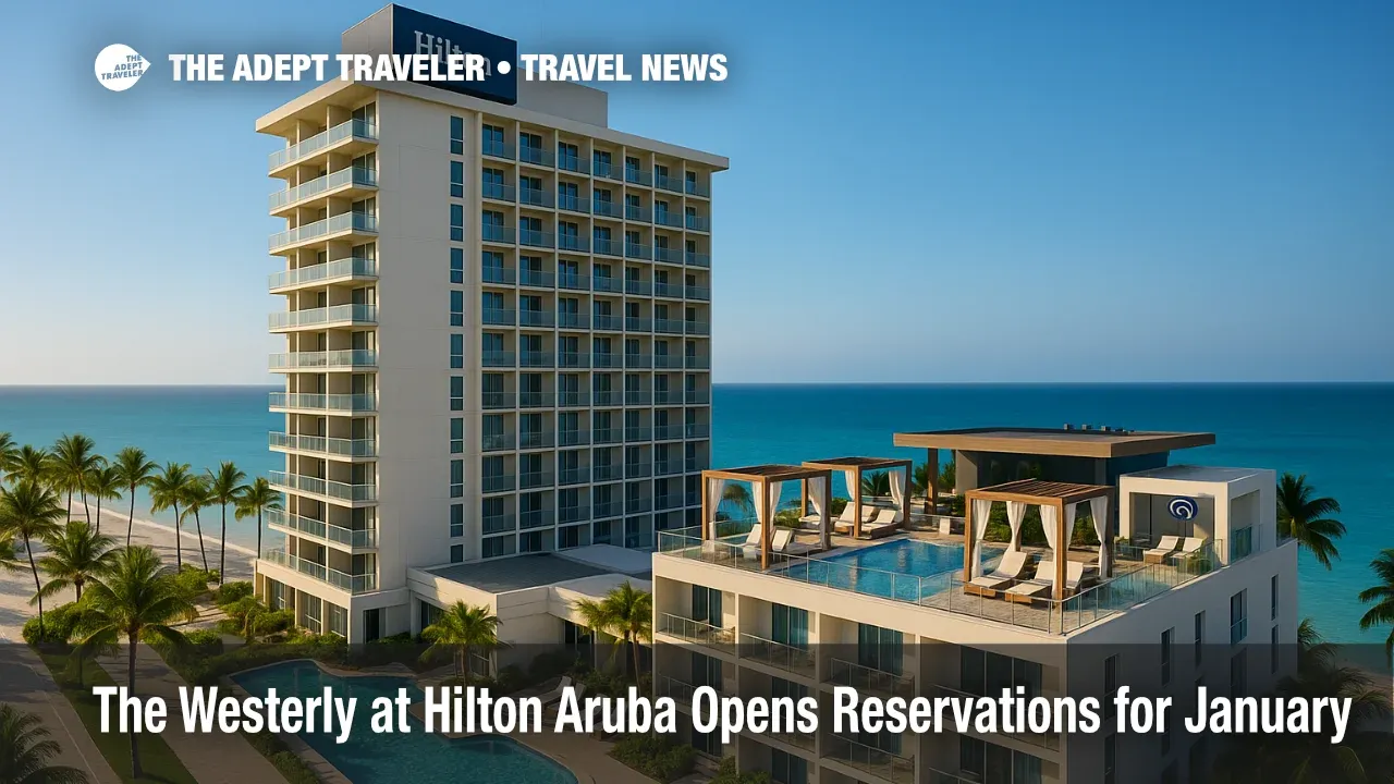 Oceanfront view of The Westerly at Hilton Aruba with adults-only rooftop cabanas and pools, highlighting luxury resort amenities on Palm Beach.