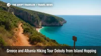 Hikers follow a clifftop trail above Gjipe Beach's turquoise Ionian cove on a Greece and Albania hiking tour, under a clear mid-morning sky.
