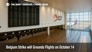 Departures hall at Brussels Airport with canceled flights board during Belgium national strike, illustrating widespread air travel disruptions.