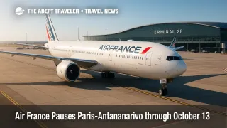 Air France jet at Paris Charles de Gaulle with apron activity, illustrating the Air France Antananarivo suspension and rerouting via Nairobi or Johannesburg.