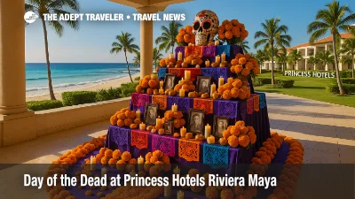 A vibrant Day of the Dead altar at a Riviera Maya resort with marigolds, candles, and photos, highlighting Princess Hotels' cultural celebration.