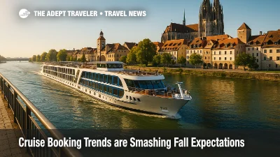 A modern river cruise ship glides past a historic European quay, illustrating strong cruise booking trends into 2026 and 2027.